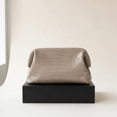 Mole Croco-embossed leather clutch